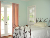 Jupiter Waterfront with Plantation Shutters and Custom Curtains