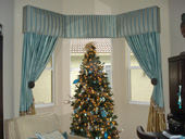 Palm City Bedroom with Custom Cornice and Silk Drapery Panels